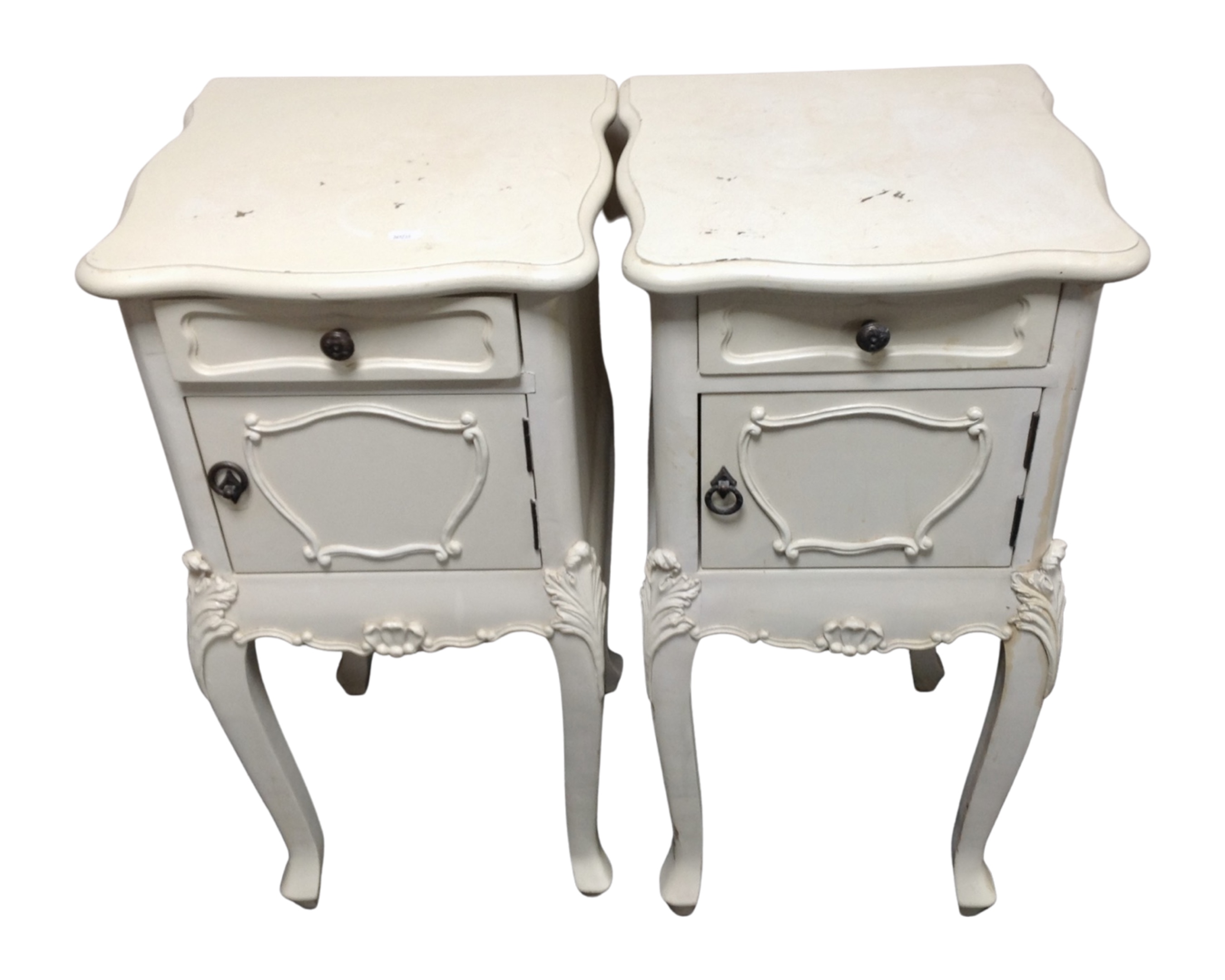 A pair of French style bedside cabinets fitted a drawer on raised legs