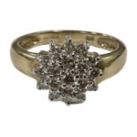 A 9ct gold diamond set cluster ring, size M. CONDITION REPORT: 2.
