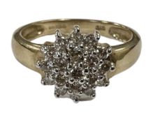 A 9ct gold diamond set cluster ring, size M. CONDITION REPORT: 2.