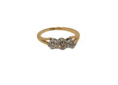 An antique 18ct gold platinum three stone diamond ring, size I CONDITION REPORT: 2.