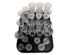 A tray containing assorted drinking glasses.