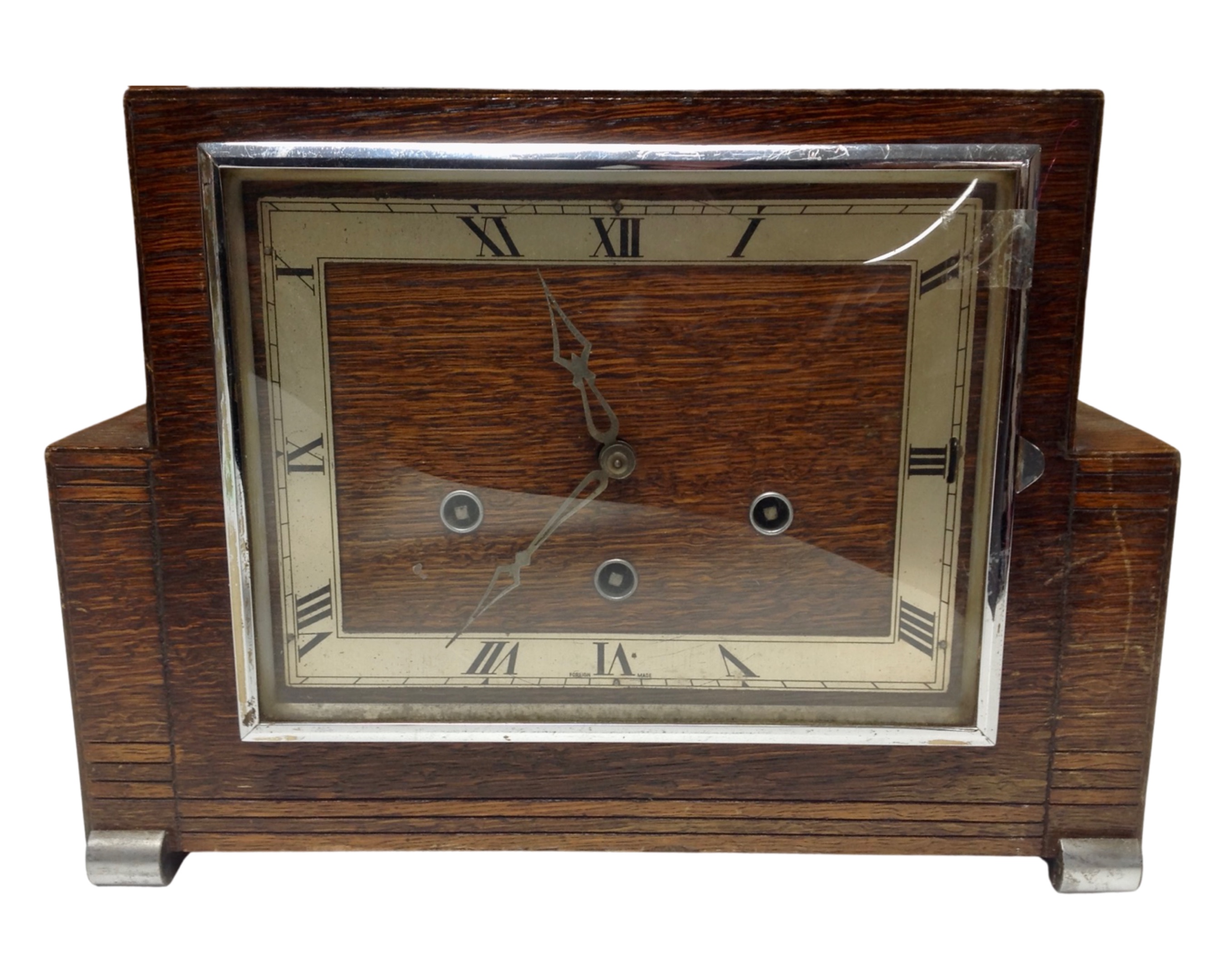 An oak cased Art Deco mantel clock.