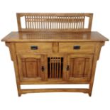 An oak Arts and Crafts style sideboard