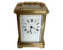 A brass cased French carriage clock.