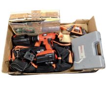 A box containing a Black and Decker 18v electric drill with batteries and charger,