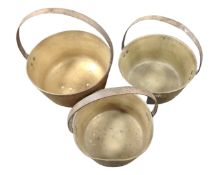 Three antique brass cast iron handled jam pans.