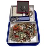 Two boxes containing a large quantity of assorted costume jewellery.