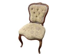 A French beechwood occasional chair on cabriole legs.