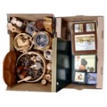 Two boxes containing place mats and coasters together with treen items including rose bowls,