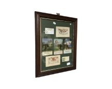 A framed montage of World War I postcards.