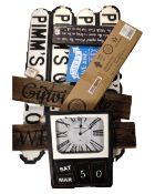 A box containing assorted wooden notices, a battery operated calendar wall clock.