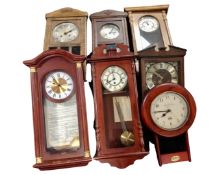 Seven assorted Edwardian and later wall clocks.