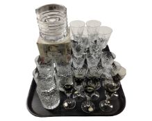 A tray containing assorted drinking glasses including lead crystal whiskey tumblers and a boxed