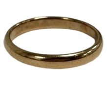 A 22ct gold band ring, size L. CONDITION REPORT: 3.