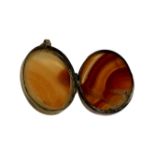 A Victorian pinchbeck and agate locket