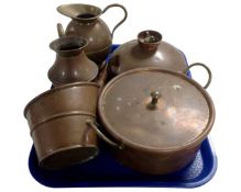 A tray containing antique copper ware including a bed warmer, a lidded pan,