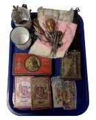 A tray containing South African 1900 Soldier's New Testament and tin, sewing items,