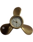 A Squadron brass cased ships propeller wall clock.