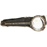 A five string banjo a/f CONDITION REPORT: Needs new vellum.