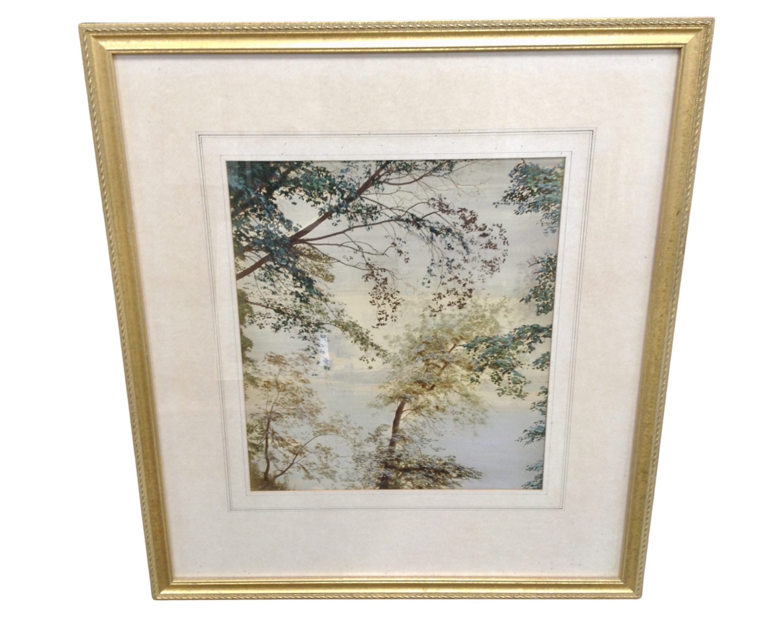 A watercolour depicting a misty morning, in gilt frame and mount.