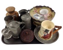 A tray containing wooden tobacco jars, pewter tankards, a Royal Doulton John Peel musical tankard,