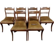 A set of six 19th century Regency style mahogany dining chairs.