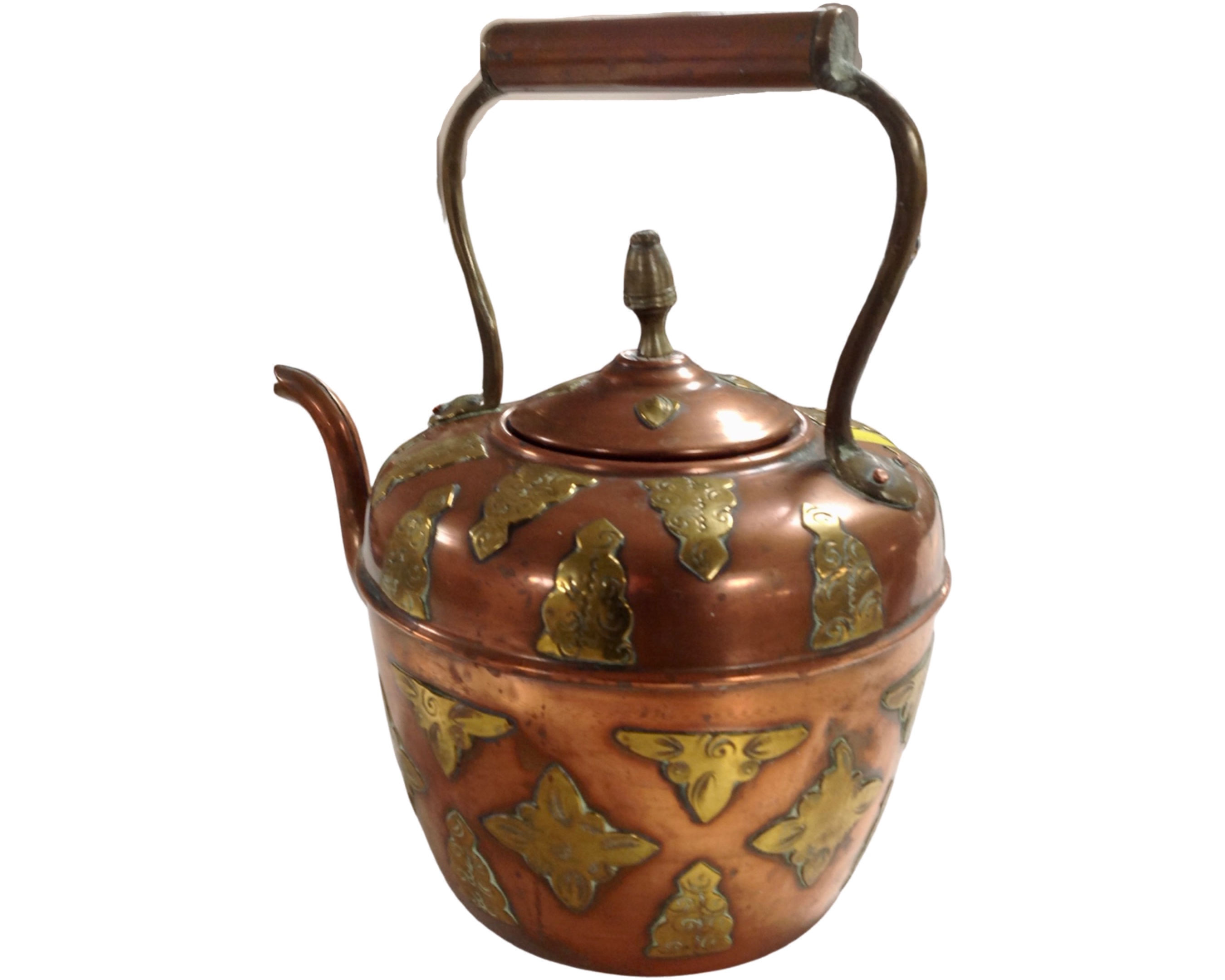 An Eastern brass and copper kettle.