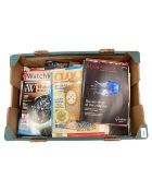 A box containing a large quantity of books relating to antiques, watches,