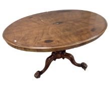 A Victorian oval mahogany tilt top pedestal breakfast table.