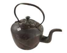 A 19th century copper kettle.