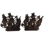 A pair of metal ship bookends.