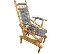 A 20th century continental oak rocking chair.