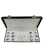 Twelve silver rings in fitted case