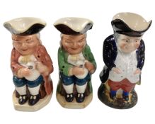 Two large Burlington Toby jugs together with a further Toby jug.
