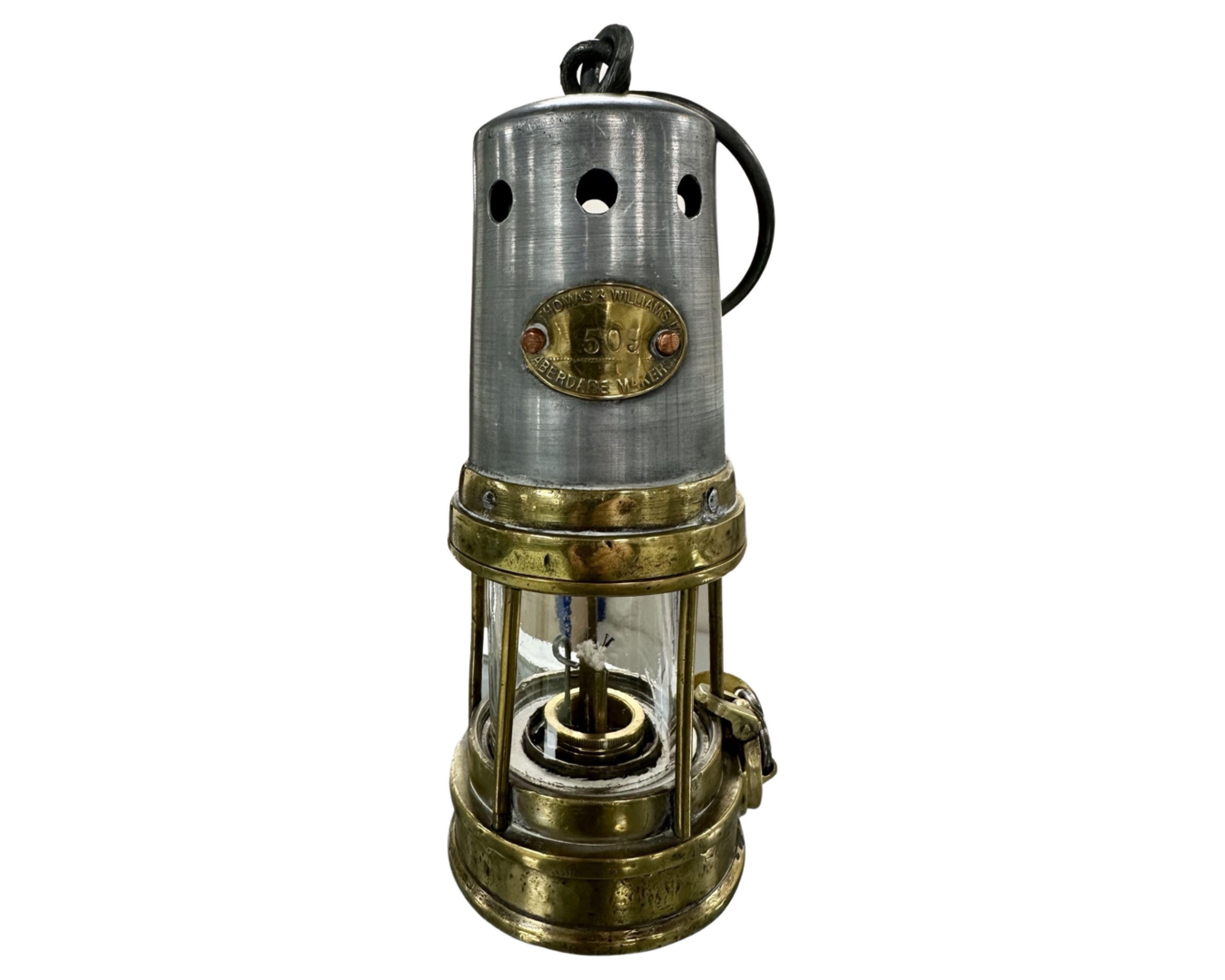 A vintage Thomas and Williams Aberdare miner's lamp, with numbered tag.