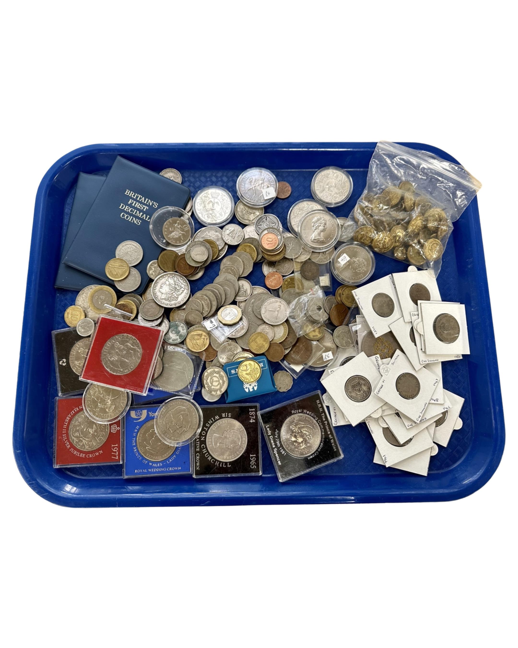 A tray of crowns, military buttons, assorted British and American coins,