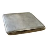 A silver compact.