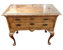A George III oak and pine two drawer low boy on cabriole legs with later plate glass top.