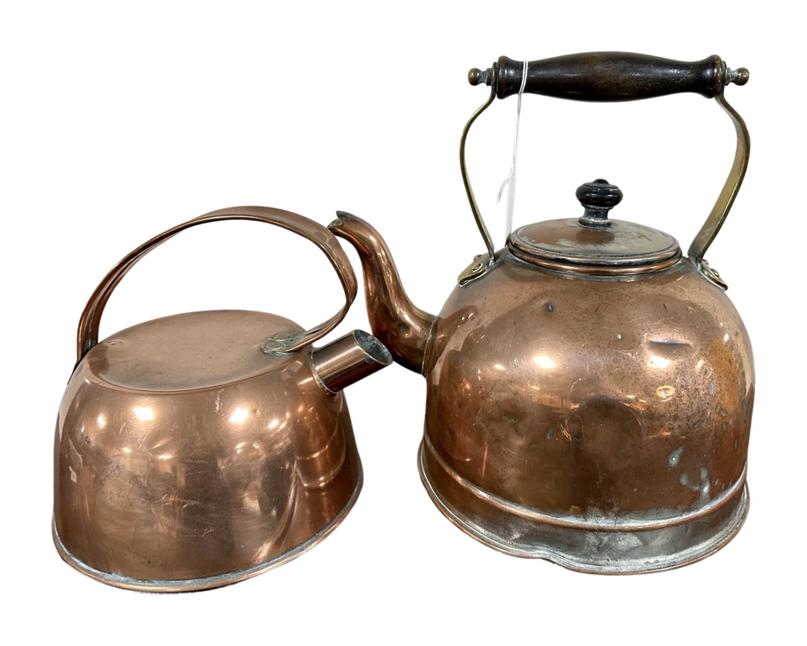 Two copper kettles, one with brass and beech handle.