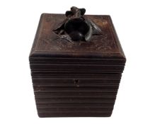A carved Black Forest table box.