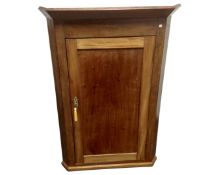 A Victorian mahogany panel door hanging corner cabinet.