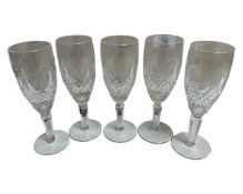A set of five Waterford Crystal 'Colleen' champagne glasses, height 18.75cm.