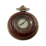 A Fossil metal and leather cased pocket watch.