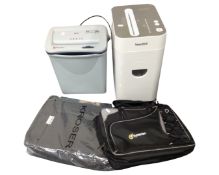 Two paper shredders by Rexel and Swordfish together with two laptop bags.