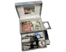 A jewellery box containing costume jewellery, wrist watches, cameo brooch, badges etc.