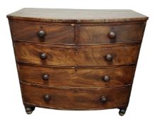 A Victorian mahogany bow fronted chest of five drawers.