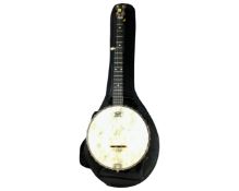 A five string open back banjo