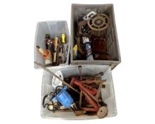 Three plastic tubs of hand tools, wood plane, gas stove,