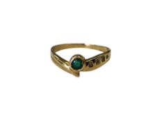 An 18ct gold emerald and diamond ring CONDITION REPORT: 2.