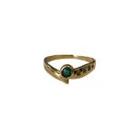 An 18ct gold emerald and diamond ring CONDITION REPORT: 2.